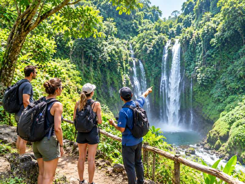 Travelers visiting waterfalls and green scenery in Senaru Lombok