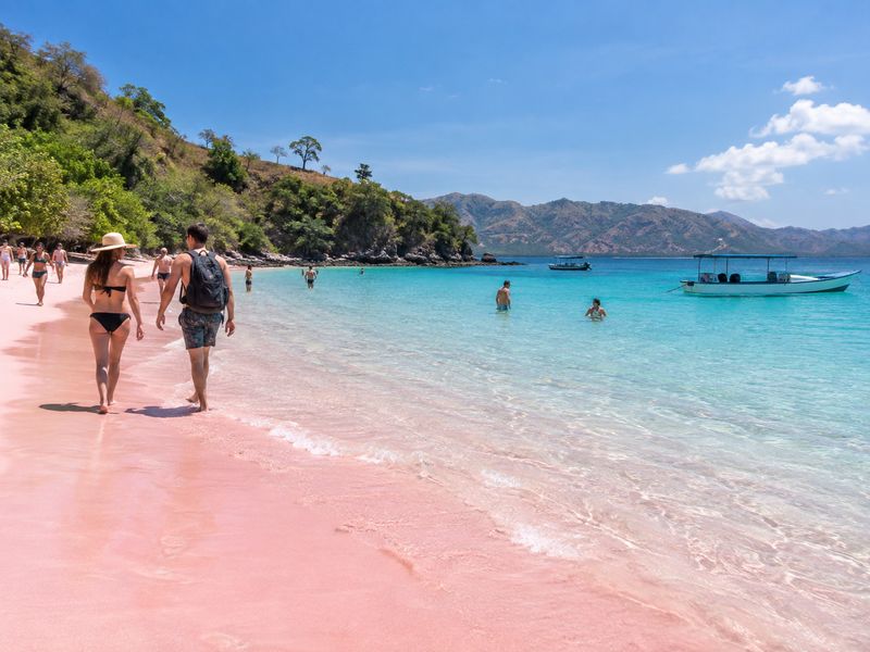 Travelers visiting Pink Beach during a Lombok day tour