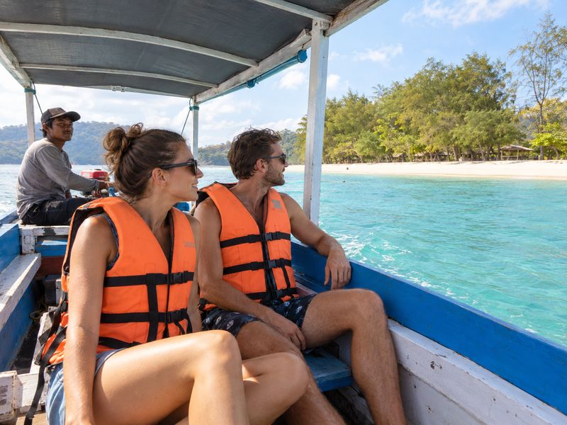 traveler enjoy a boat trip along the coast of Lombok