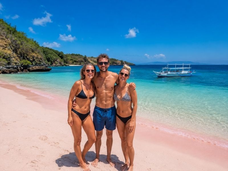 Group travelers at Pink Beach Lombok