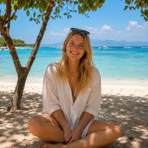 Female traveler relaxing at Pink Beach Lombok