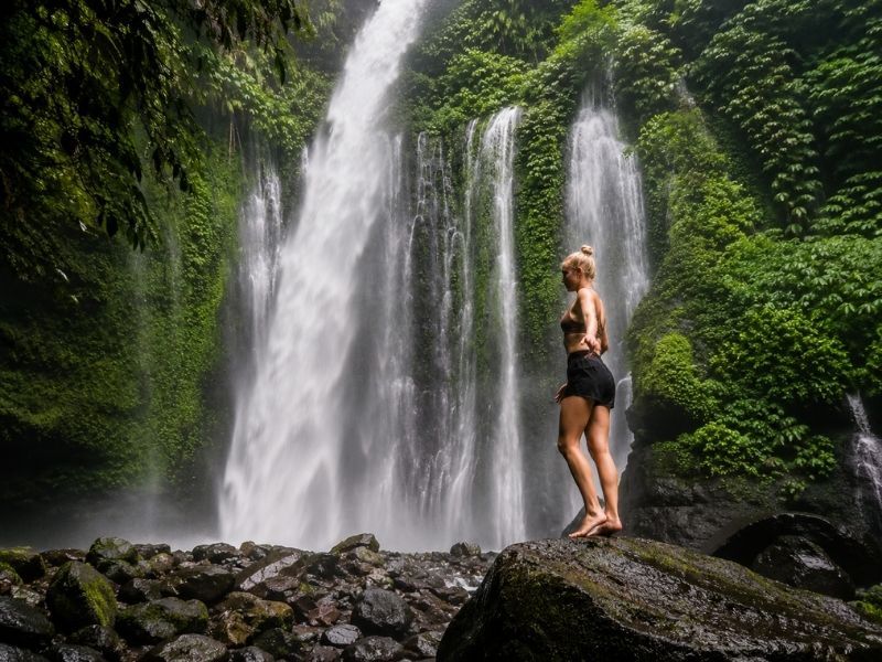 Tiu Kelep Waterfall with traveler